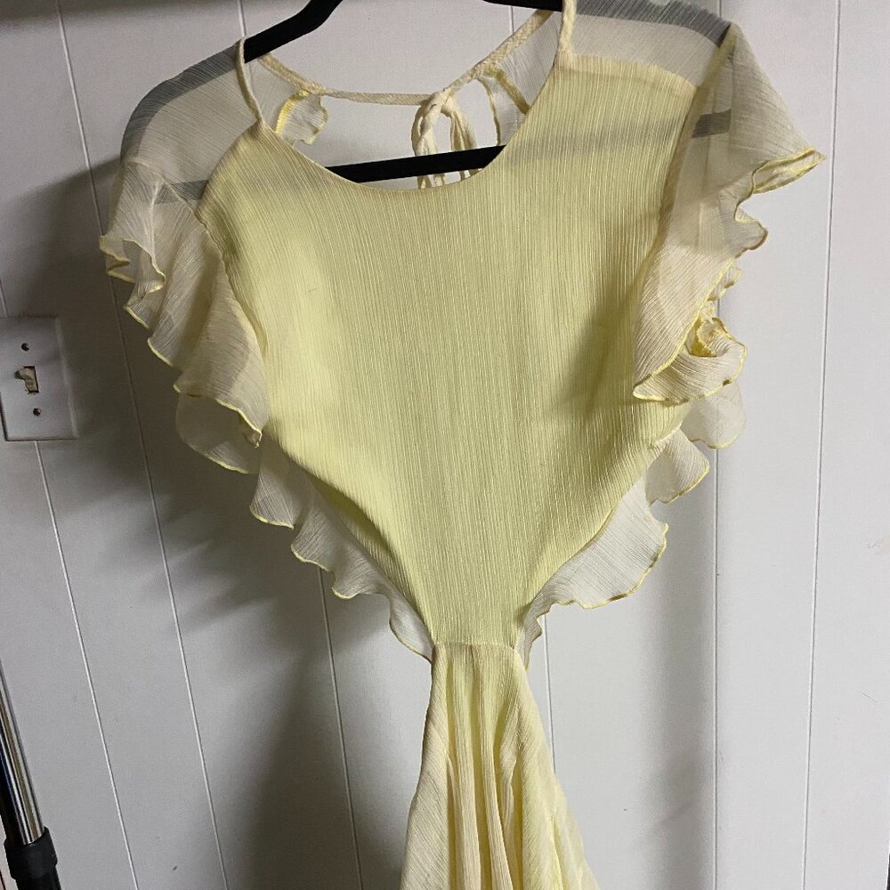 Lucy in the Sky Yellow Flowy Romper with Open Back